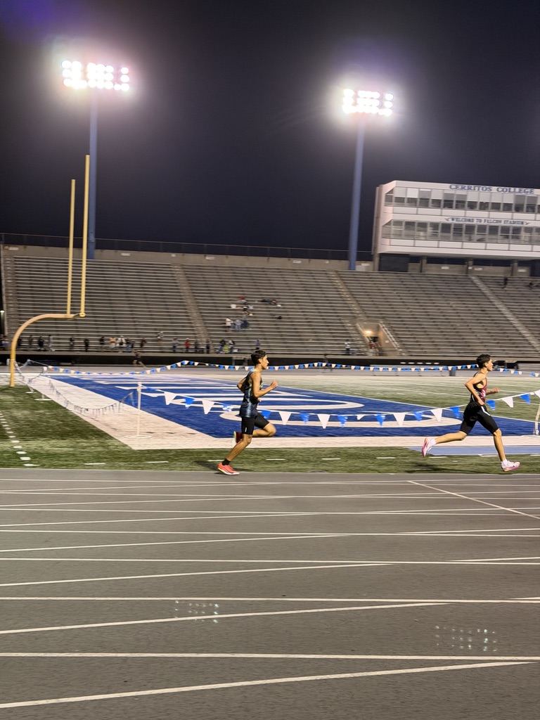 Noah Olivares competing under the lights at Cerritos College during USATF Region 16